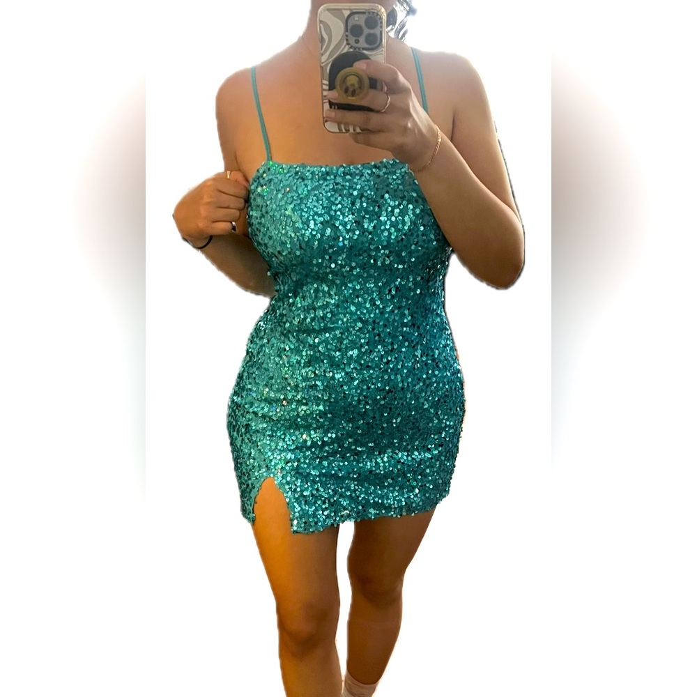 Turquoise minidress with leg slit and lace up back